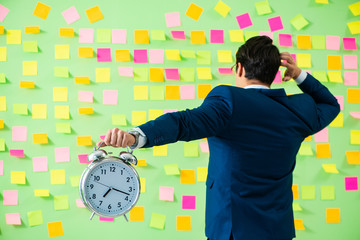 Businessman with many business priorities