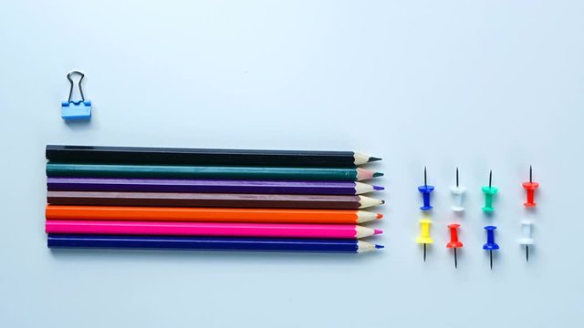 School Stationary Flat Lay on White Background Timelapse 4K
