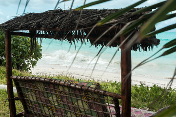 Gazebo for relaxing with wood on the ocean.