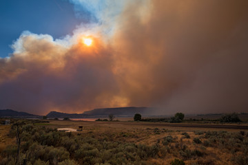 Smoke from the Grass Valley Fire engulfs the canyon around Banks Lake