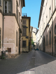 Fototapeta premium Orvieto,Italy-July 28, 2018: Alley in Orvieto, Umbria