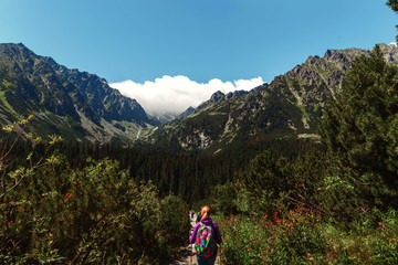 Fototapeta na wymiar Mountain landscape traveler backpack High tatras mountains Slovakia