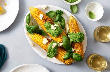 Sweet fried corn pesto sauce feta cheese white wine
