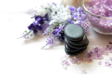 Obraz na płótnie Canvas Lavender aromatherapy Spa with rock stone spa. Thai Spa relax Treatments and massage white background. Healthy Concept. select and soft focus