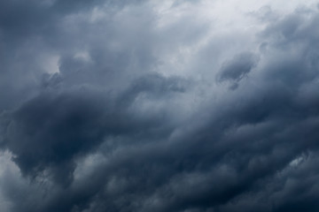 Fototapeta na wymiar Dramatic black clouds and motion, Dark sky with thunderstorm before rainy