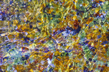 Colorful stones and rocks along the beach in Leland along Lake Michigan in northern Michigan
