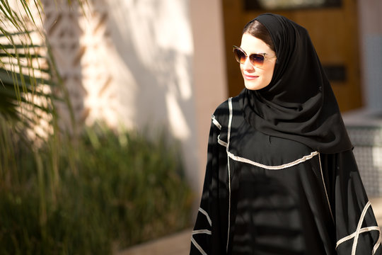 Arab woman looking away.