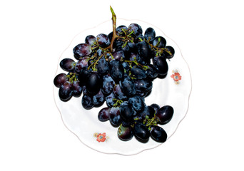 the grapes lie on a plate