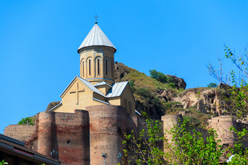 Fototapeta na wymiar Impregnable ancient fortress Narikala and church of St. Nicholas in Tbilisi, Georgia