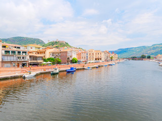 River embankment in the city of Bosa with colorful, typical Italian houses. province of Oristano,...