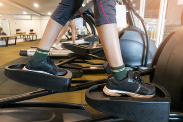 Fototapeta na wymiar leg woman workout in fitness gym