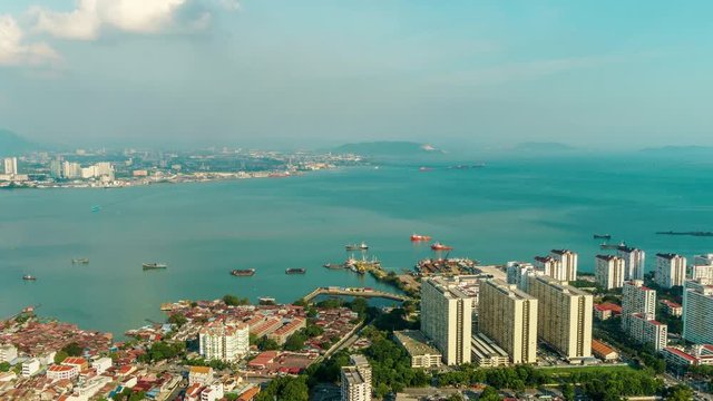 Day view of the city and sea bay of George Town, Malaysia in summer sunny day. 4k time lapse