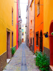 Obraz na płótnie Canvas View of the beautiful, colorful, narrow street in Bosa. province of Oristano, Sardinia,