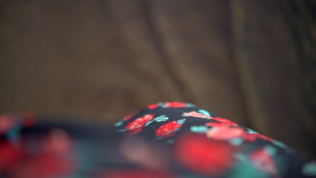 Skirt in the wind filmed from the girl perspective in the sea water