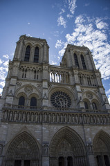 Fototapeta na wymiar Notre Dame cathedral facade in Paris, France 