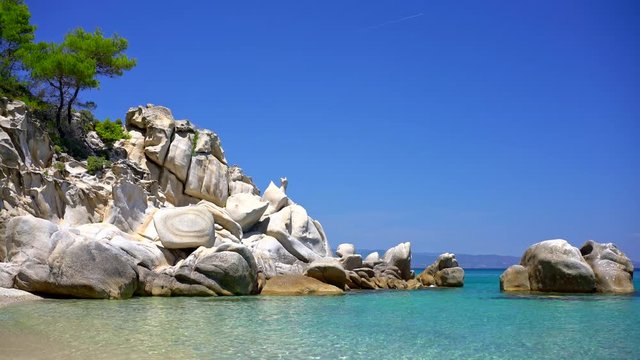 Sunny sandy beach with clear water