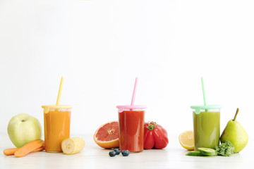 Composition of healthy detox  juices and smoothies with  seeds. Healthy vegetables and fruits on the white background, copy space