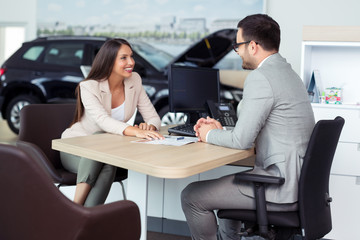 Sales manager at a showroom car is worth to the buyer