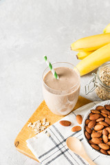 Healthy breakfast smoothie banana oatmeal almond milk