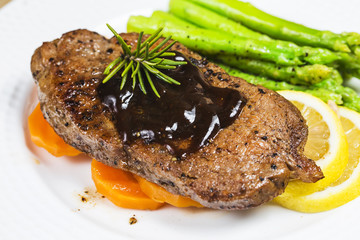 Fried steak, asparagus