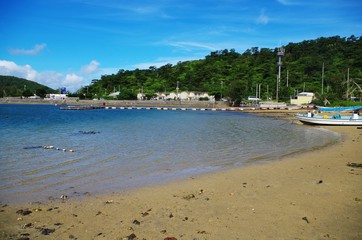 Fototapeta na wymiar 沖縄の田舎の漁港