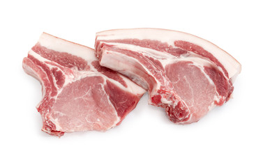 Uncooked pork loin chops bone on a white background