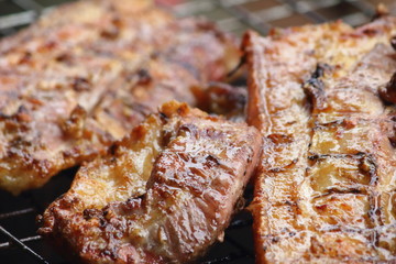 delicious food pork grilling on hot charcoal