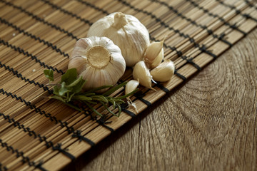 Close purple garlic and pepper