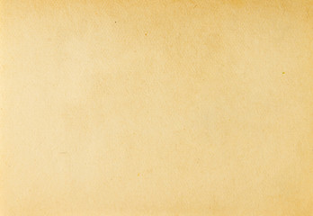 background texture of old faded yellow paper
