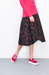stylish woman in long skirt with shoes fashion concept