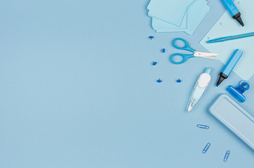 Pastel blue color office stationery set on blue background, concept art for advertising, business,...