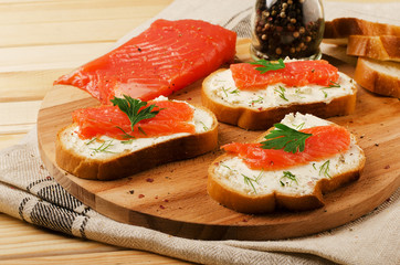 Appetizer with salmon and cottage cheese cream