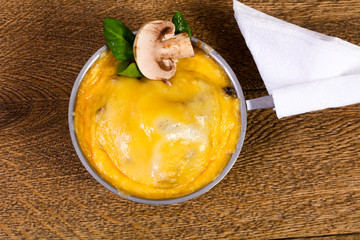 Mushroom cocotte with cheese