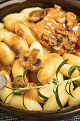 Braised pork chop with mushrooms.