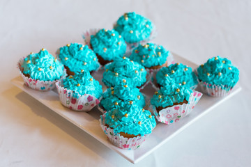 Cupcakes with turquoise cream