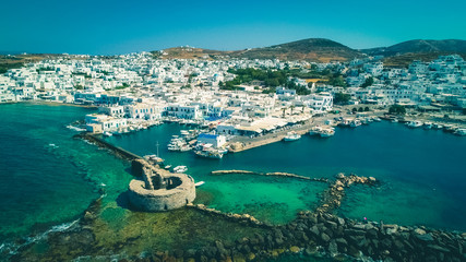 Ancient ruins of Venetian castle in the harbor of Naoussa town, view from above, Paros island,...
