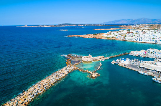 Ancient ruins of Venetian castle in the harbor of Naoussa town, view from above, Paros island, Greece