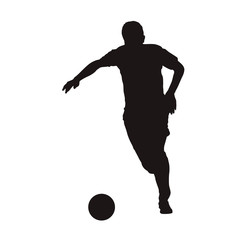 Football player running with ball, front view. Isolated vector silhouette. Soccer player