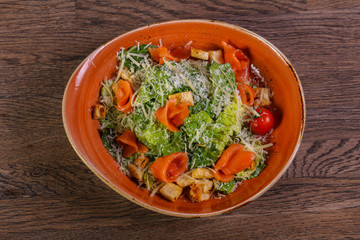 Caesar salad with salmon
