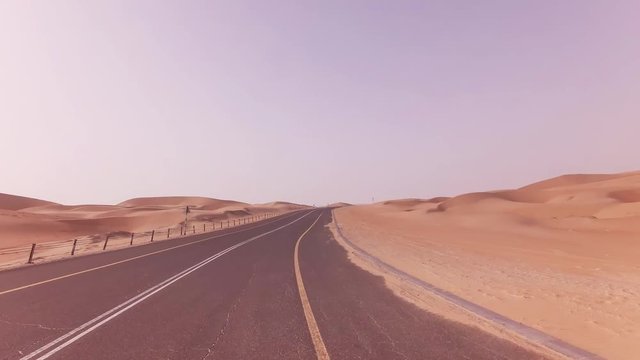 New road from Oasis Liwa to Moreeb Dune in Rub al Khali desert stock footage video