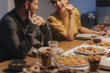 Friends Enjoying at Dinner Party