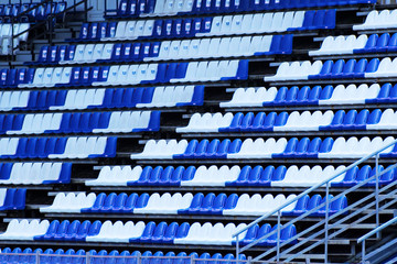 Fototapeta premium amphitheater of dark blue and white seats abstract background