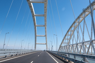 Fototapeta na wymiar Cars go on the Crimean automobile bridge