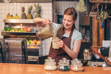 Attractive girl with smoothie