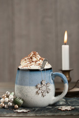 Mug Of Hot Chocolate. Burning Candle. Christmas Decorations.