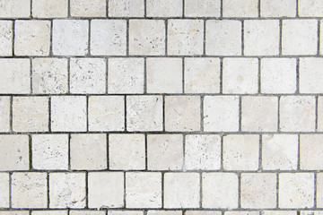 Outdoor white stone floor tile pattern and background