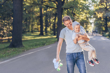 Happy family with a skateboard