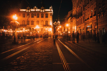 Old European city pedestrian street night city lights - 217668904