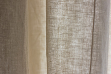 The texture of natural linen fabric beige curtains background