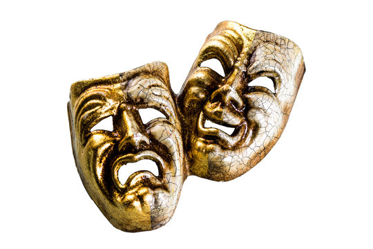theatrical masks evil and good lie on a white background